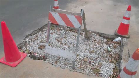 City fills giant street holes after FOX 2 report